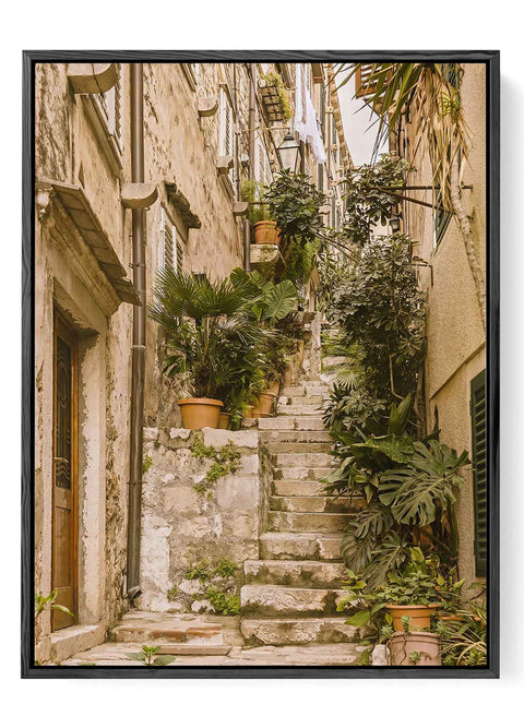 European village steps with lush greenery
