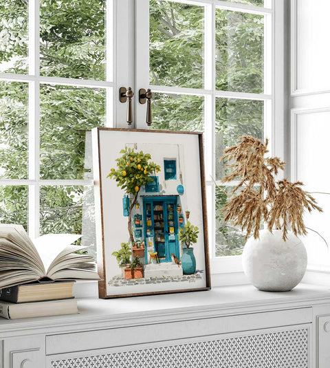 Aegean island village storefront artwork showing books inside open blue doors