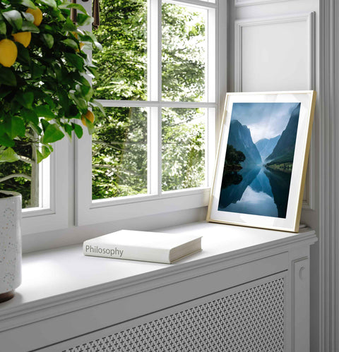 Aesthetic fjord photography in a cool-toned, neutral color palette.