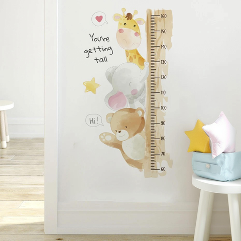 Bear elephant giraffe ruler