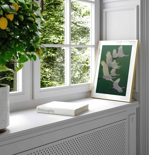 Contemporary nature decor featuring halved apples on a neutral background.