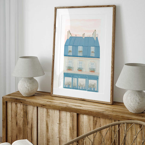 Elegant European facade in watercolor with window planters

