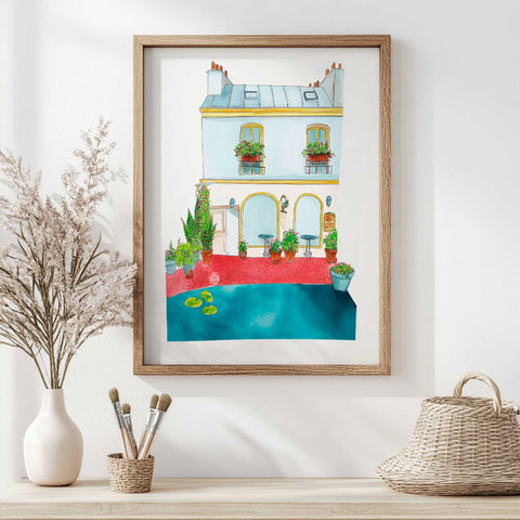 Fine art print of charming French café with reflective pond

