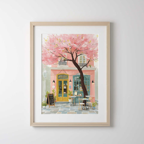 French café wall art with pink blossoms