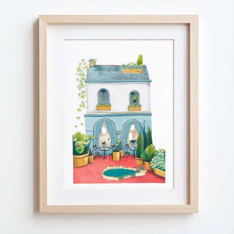 Hand-painted print of tranquil courtyard café with plant decor

