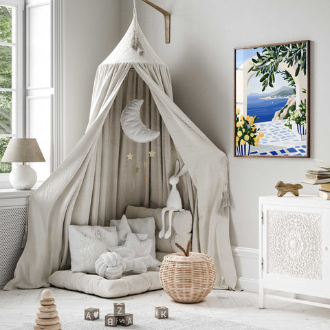 Lemon tree and ocean watercolor under white arched patio

