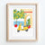 Lemon trees in pots beside a classic yellow scooter print