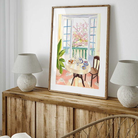 Light-filled French window scene with tea and cherry trees

