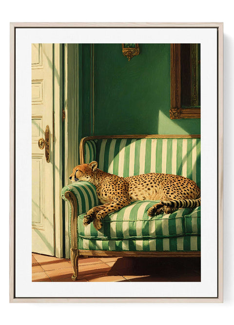 Luxury art print of a cheetah lounging on a plush emerald green sofa.