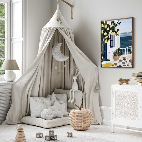 Mediterranean sea view with yellow flowers and cobblestone walk

