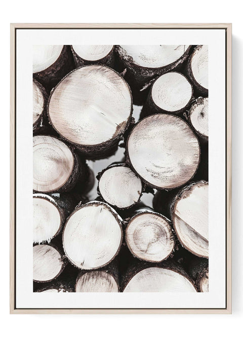 Minimalist line art print of stacked white wood logs and natural circles.