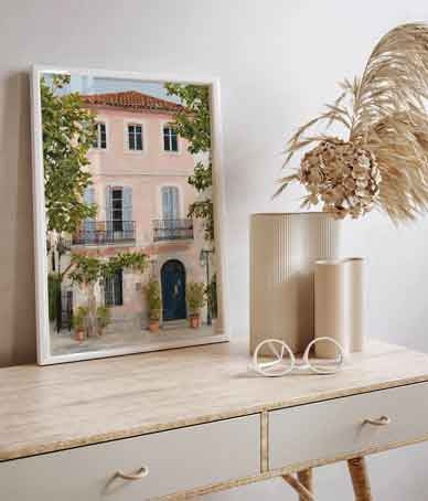 Minimalist living room poster with a soft pink, cream, and turquoise color palette.