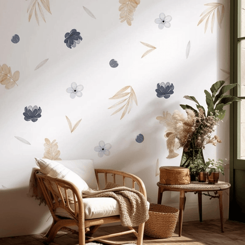 Nursery room with floral wall decals, wooden chair, and decorative plants.