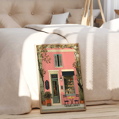 Pastel pink coffee shop painting with green vines and striped awning