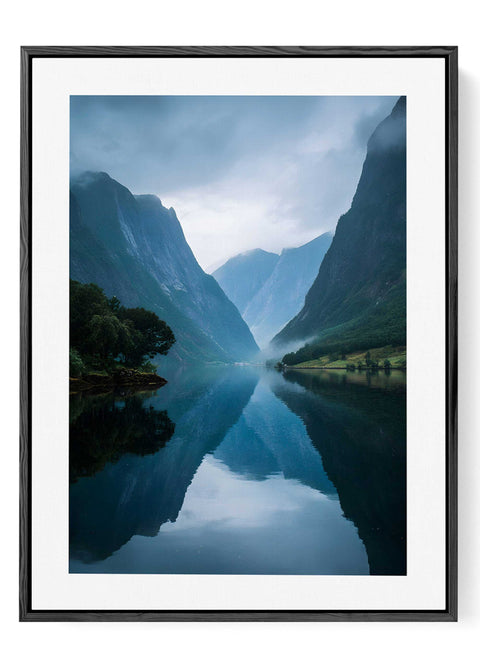 Scandinavian landscape wall decor featuring a serene mountain reflection.