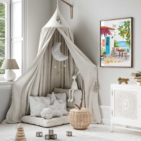 Seaside watercolor scene with outdoor chairs and ocean in background

