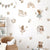 Soft pastel nursery wall art featuring unicorns and fairies