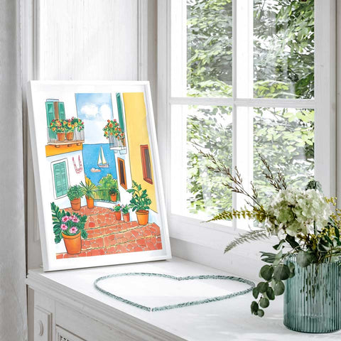 Watercolor illustration of ocean view between bright buildings

