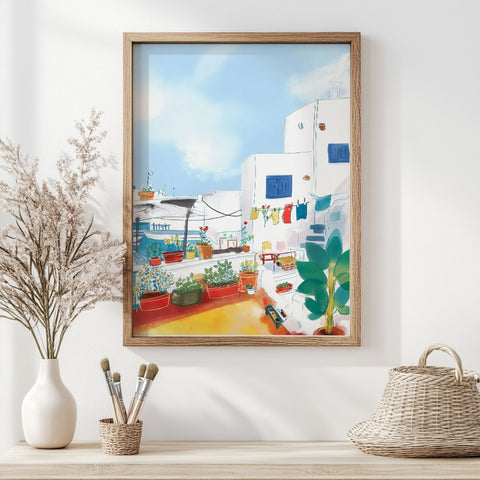 Whitewashed Greek buildings with bright accents and sunny patio

