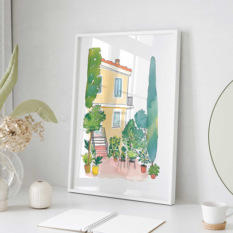 Yellow Italian house with garden art