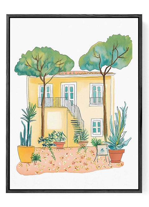 Yellow house with garden art