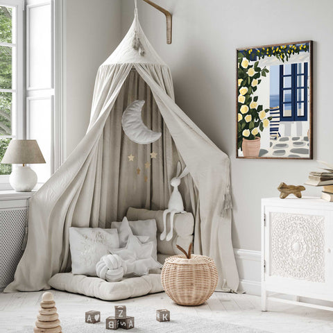 Yellow roses in clay pots by blue window on Greek island

