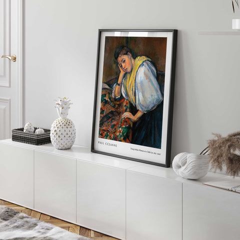 Young woman at table painting print