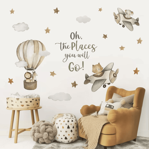 Soft pink and blue animal wall decor for kids.