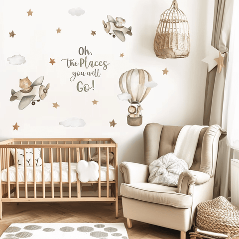 Gentle pastel animal decals on beige walls.